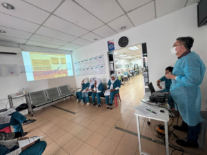 Learning Session at Sri Rampai - Participants listen and engage in a presentation during the CME session.